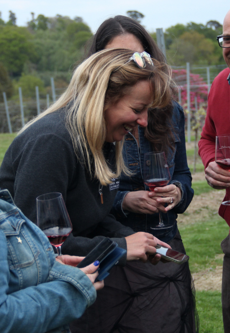 Emma showing pictures of making Pinotage